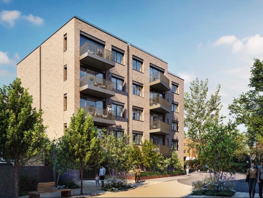A newly built Zen block of flats in pale brick, with balconies and street trees